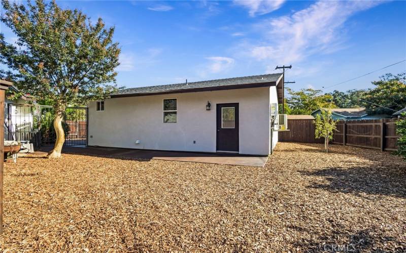 Separate fenced yard for ADU with storage shed