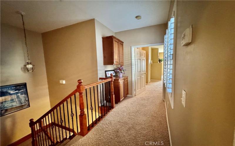 Upstairs Linen clabinets,Custom shuttersand stair rails