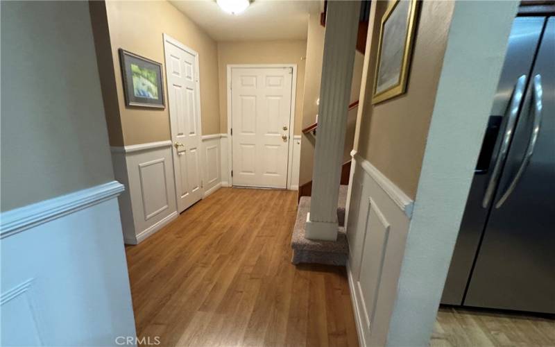 Foyer to stairs,Powder room, and Garage