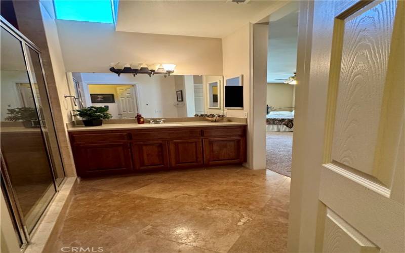 Travertine flooring,Corian counter,Skylight