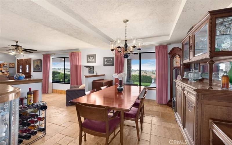 Primary Home - Formal Dining Room with Chandelier and Views to the Front of the Property