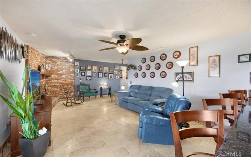 Primary Home - Another view of the Family Room with Ceiling Fan