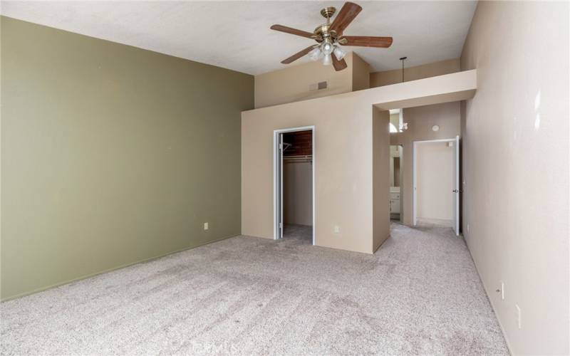 Primary bedroom and walk-in closet.