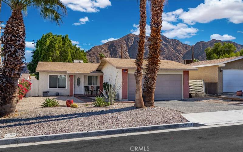 Front of home with low maintenance landscaping.