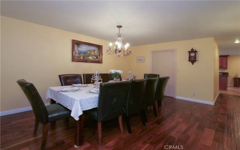 Formal Dining Room Leads to Laundry Room and Entrance to Kitchen