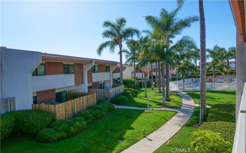 Upper Balcony View of Grounds Leading to the Pool Area