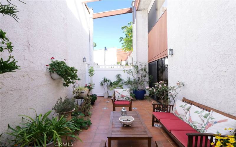 Enjoy Private Time in the Back Patio. Door to Far Left Leads to the 2 Car Garage