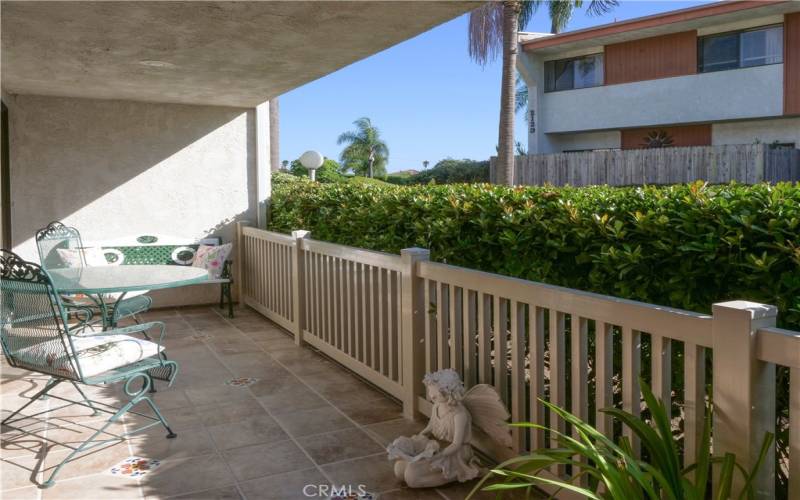 Front Private Patio. New Tiled Floor with Accent Tiles and Newly Installed Viny Fence