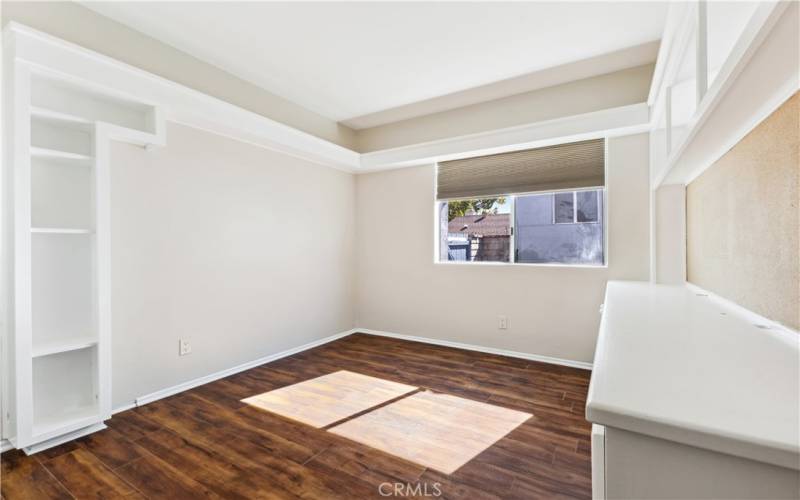 Bedroom 3, with lots of built in features including a long desk with drawers