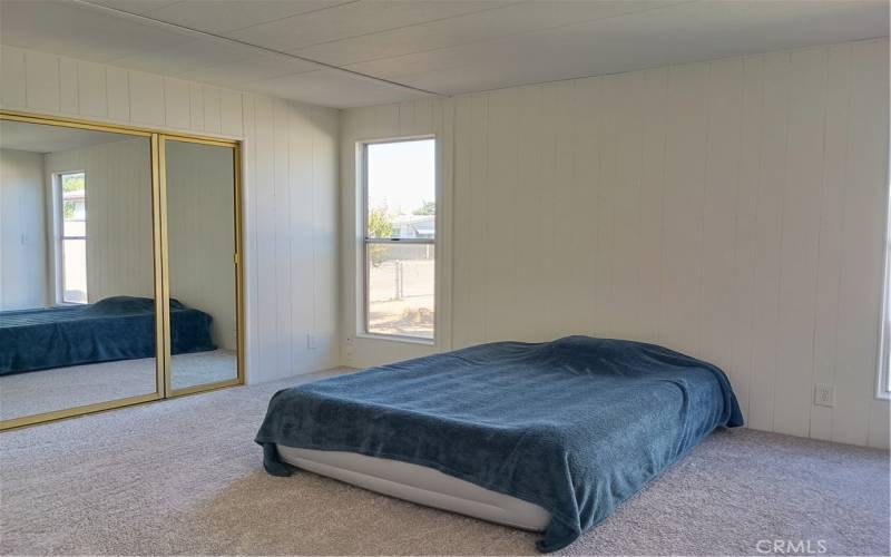 Vey spacious primary bedroom with built-in closet