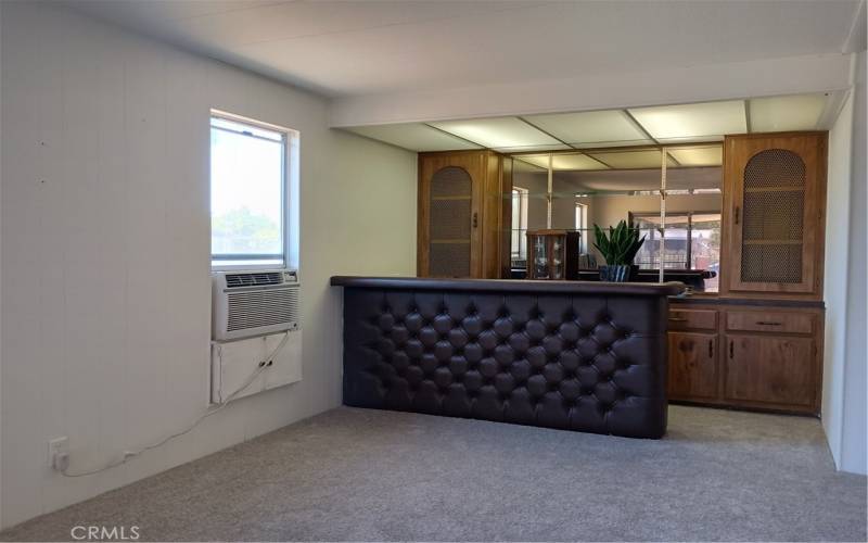 built-in bar and curio at the family room area