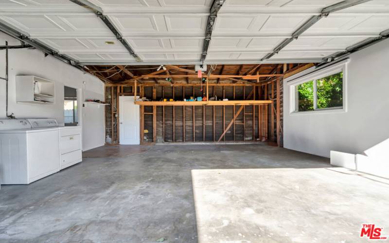 Garage with access into kitchen