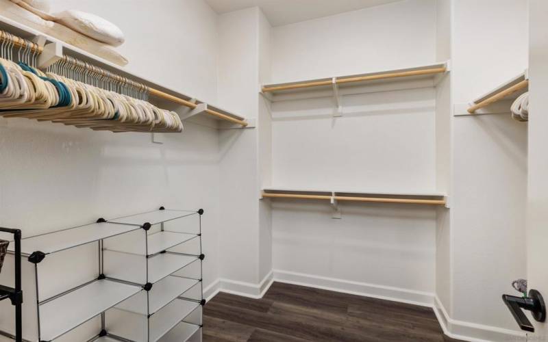 Spacious walk in closet in the primary suite.