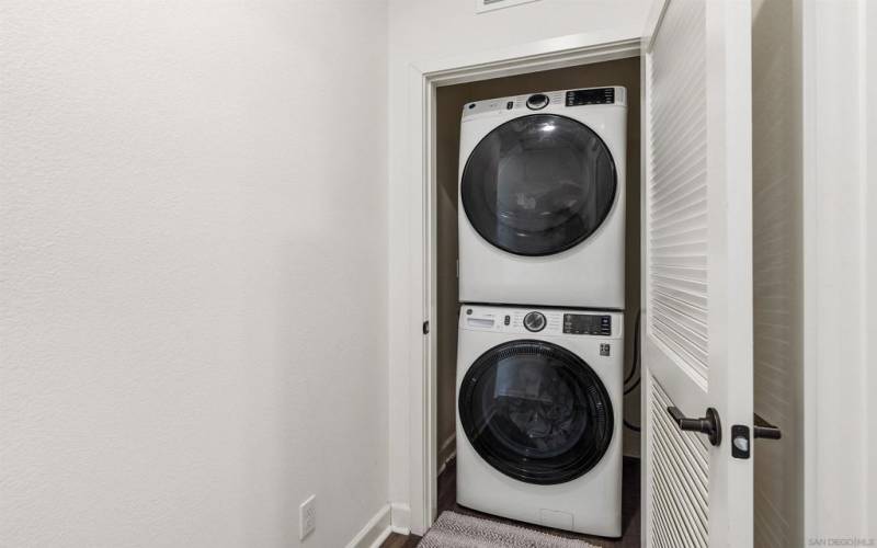 Full size washer/dryer located on the third floor adjacent to the primary suite.