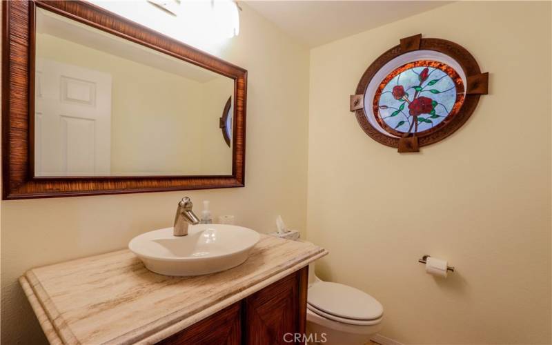 Remodeled guest bath off foyer.