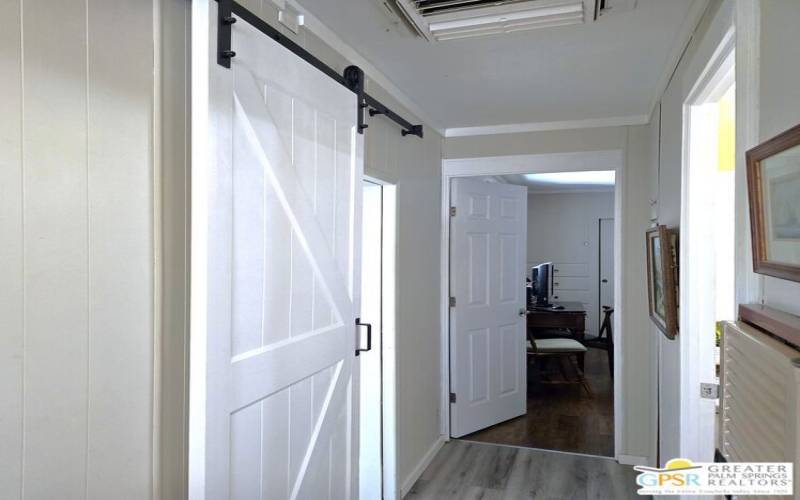 Newly Hung Barn Door Access To The 2nd Bedroom