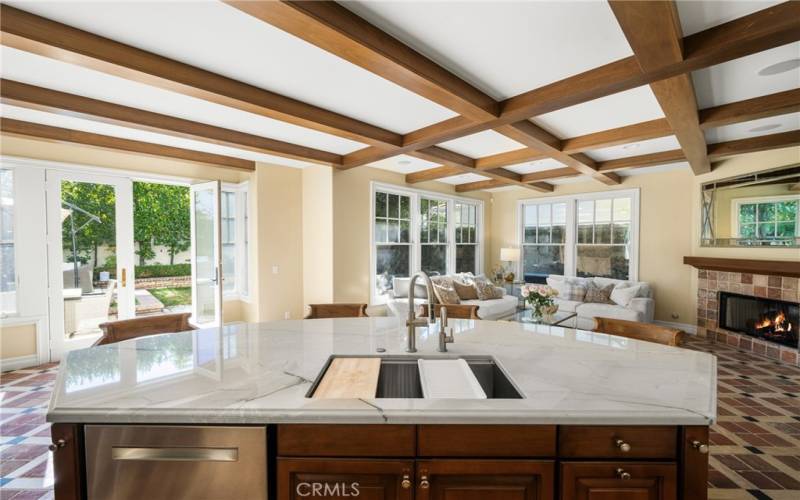 Many luxury details like the wood beams in this living area.