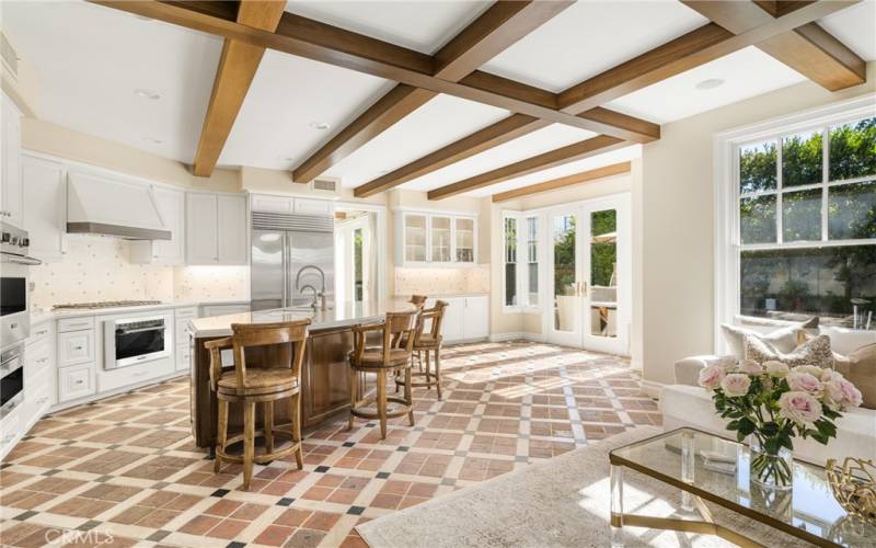 Kitchen features new Quartzite counters and custom tile backsplash