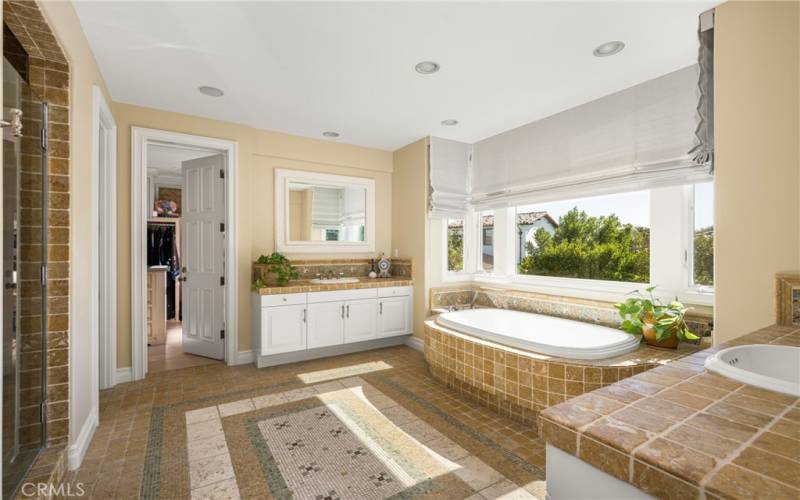 The Primary bathroom that has it all! Double sinks and soaking tub