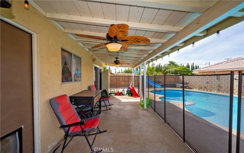 Fenced pool from back porch