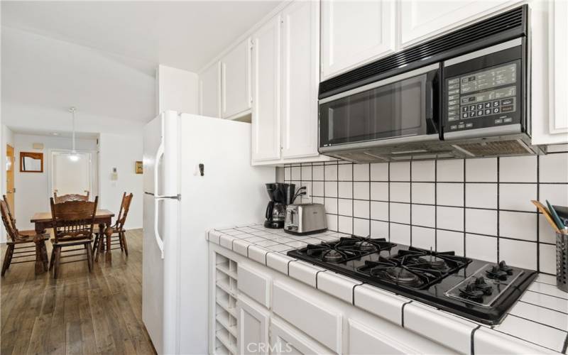 Kitchen opens to dining room.