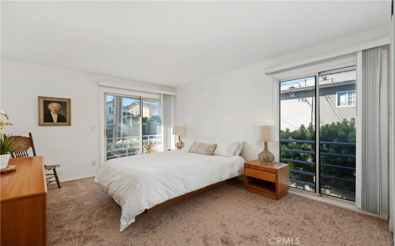 Light and bright main bedroom.