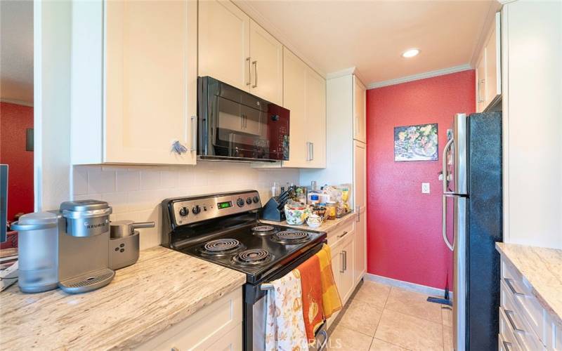 Kitchen that is fully stocked.