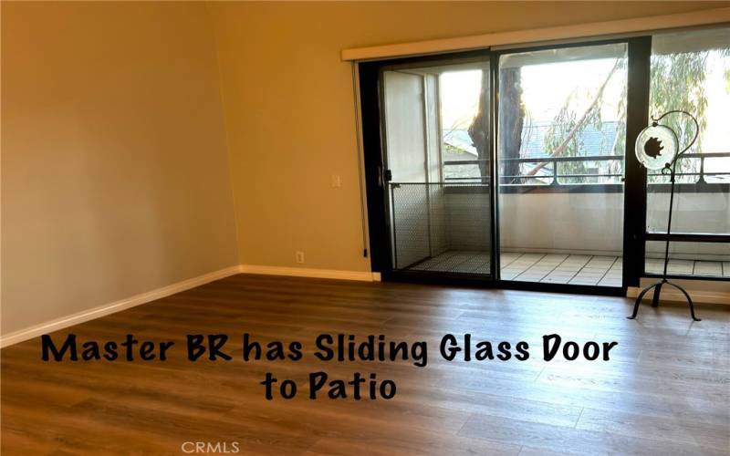 SLIDING GLASS DOOR TO PATIO.