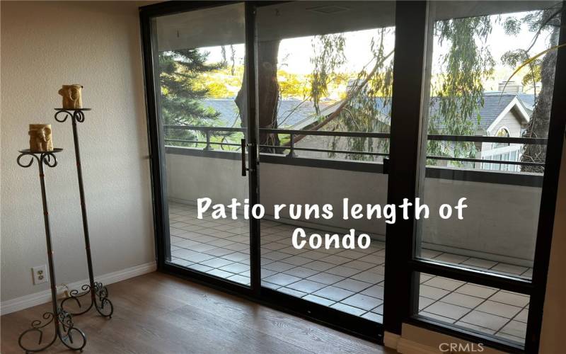 PATIO IS LENGTH OF CONDO.