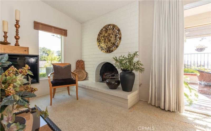 Charming arched fireplace in the living room.