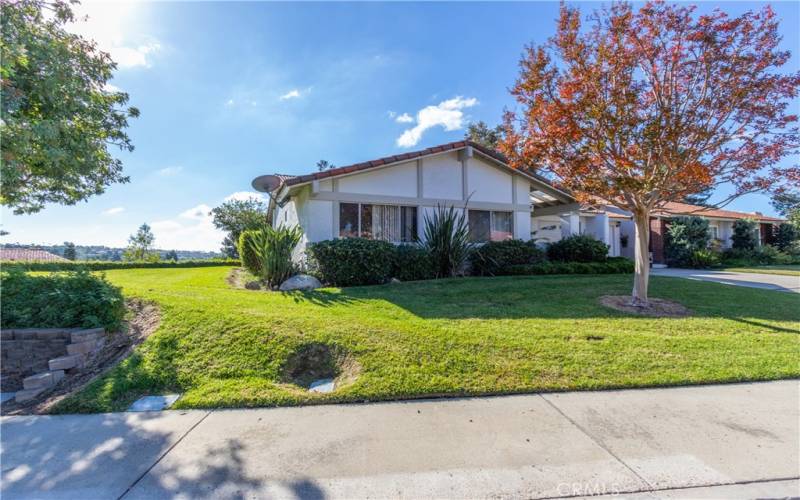 Fantastic curb appeal with a vast front and side lawn.