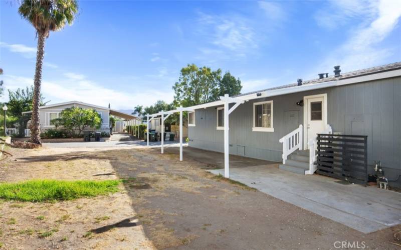 Covered Parking 2-3 cars. Spacious and large side yard