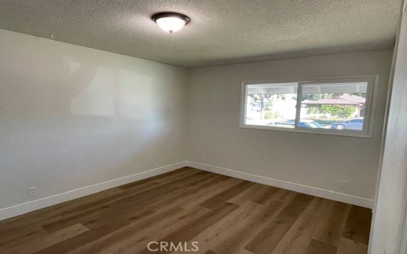 Another view of primary bedroom.