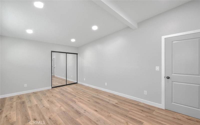 Primary Bedroom 1: New Dual Pane Windows, New Recessed Lights, New Mirror Closet Sliding Doors, New Laminate Waterproof flooring, New Baseboards. New Doors.