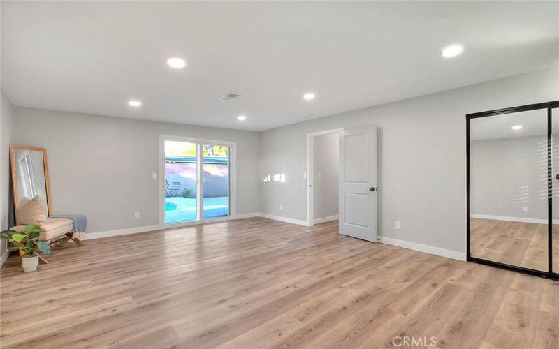 Bedroom 2: New Dual Pane Sliding Glass door to Backyard, New Recessed Lights, New Mirror Closet Sliding Doors, New Laminate Waterproof flooring, New Baseboards.