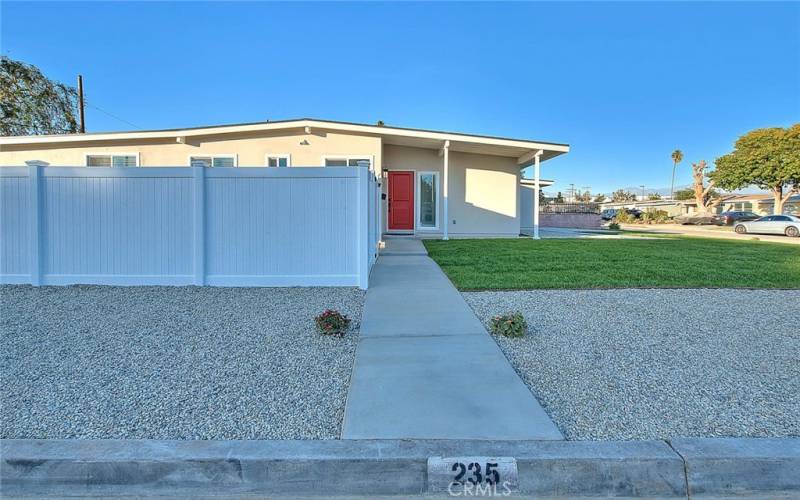 New Vinyl Fencing and Cement Walkway.