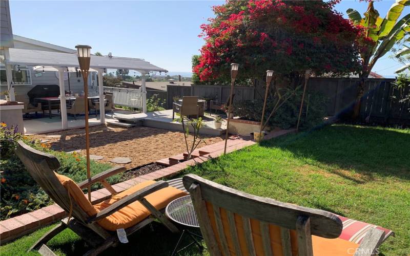 Gorgeous lush garden and yard in the back.