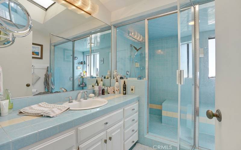 Upstairs bathroom with walk-in shower.