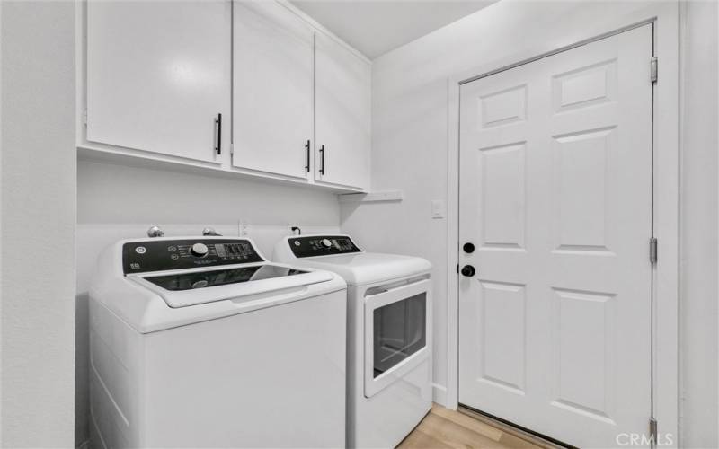 Laundry Room leading to attached 2-car garage