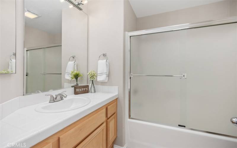 Secondary bathroom upstairs with tub shower combo