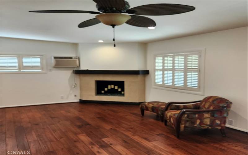 Family room with corner fireplace