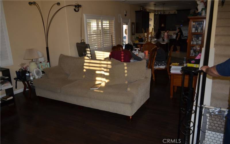 view to the kitchen from the family room