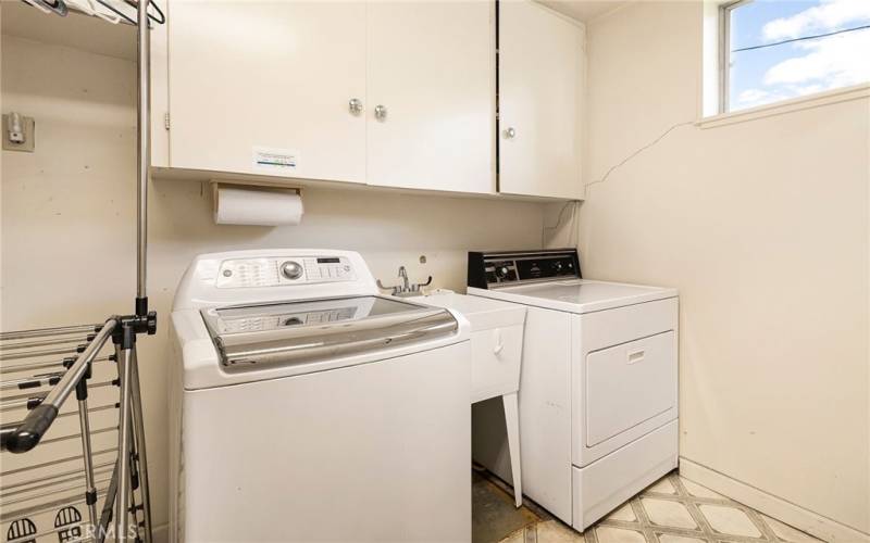 washer, dryer, third bathroom off game area and at garage walk in door