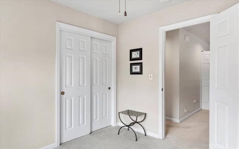 Upstairs 2nd bedroom, door opens to the hallway