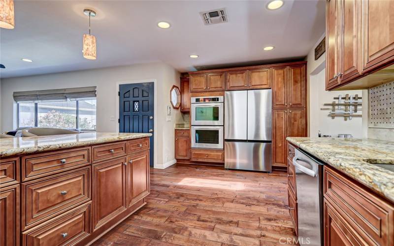 Remodeled kitchen with granite breakfast counter