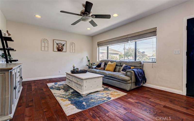 Gleaming maple wood floors throughout the home