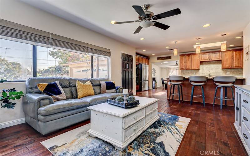 Large windows allowing natural light to flood the living room