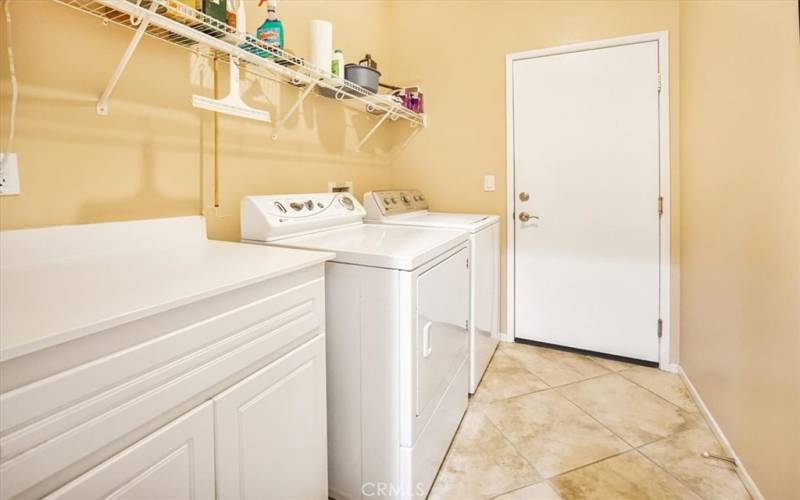 laundry room and attached 2-car garage