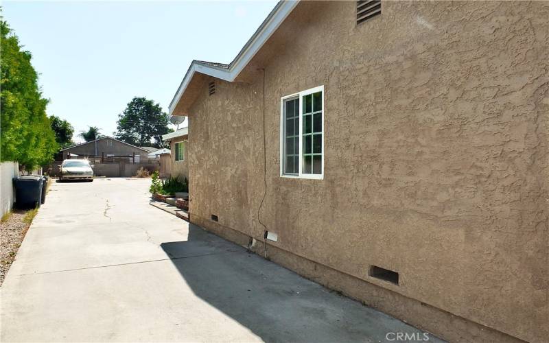 Extra long driveway that even opens up in the back!