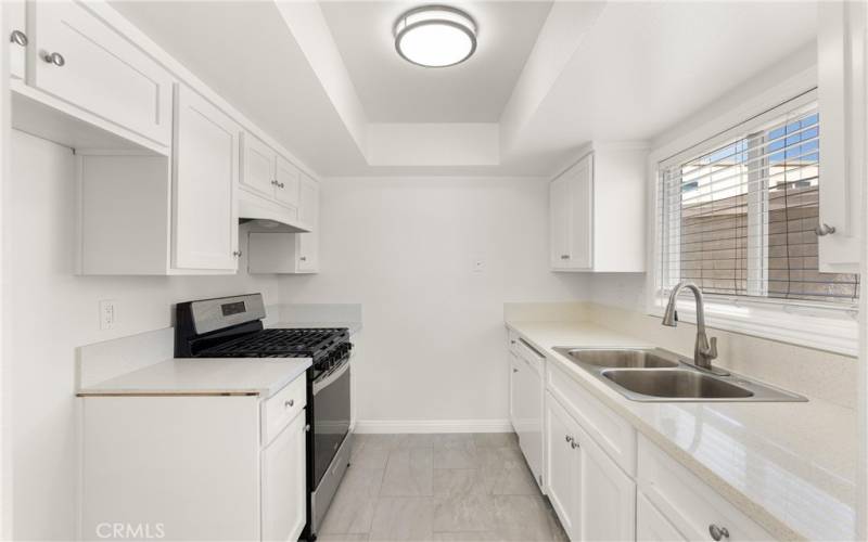 Kitchen with newer quartz countertops